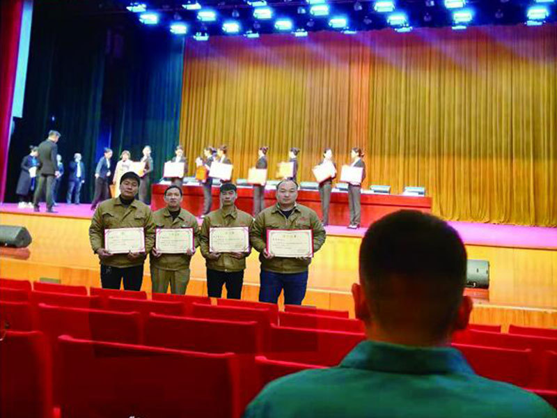 Gaoshan Valves engineers receiving awards at the 2nd Xingyang Vocational Skills Competition for CNC Turning